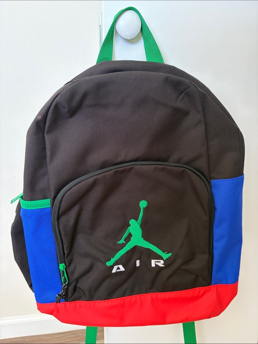 Jordan Black Backpack with Green Jumpman, Blue Panels & Red Base